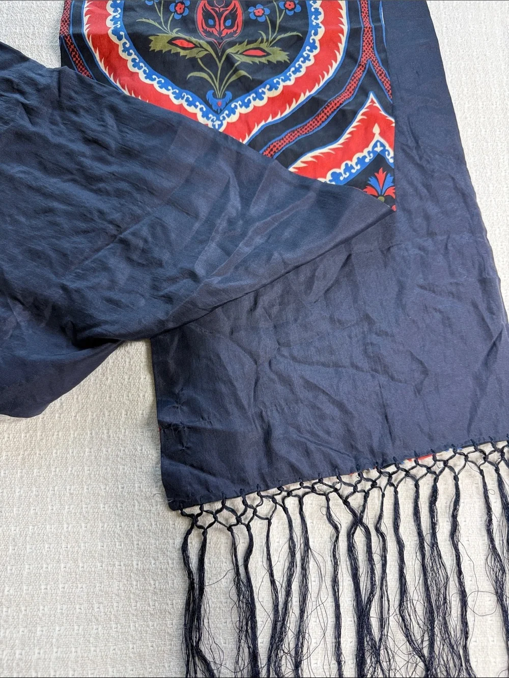Navy bkue and red print scarf with fringe, beading, and jewel embellishments